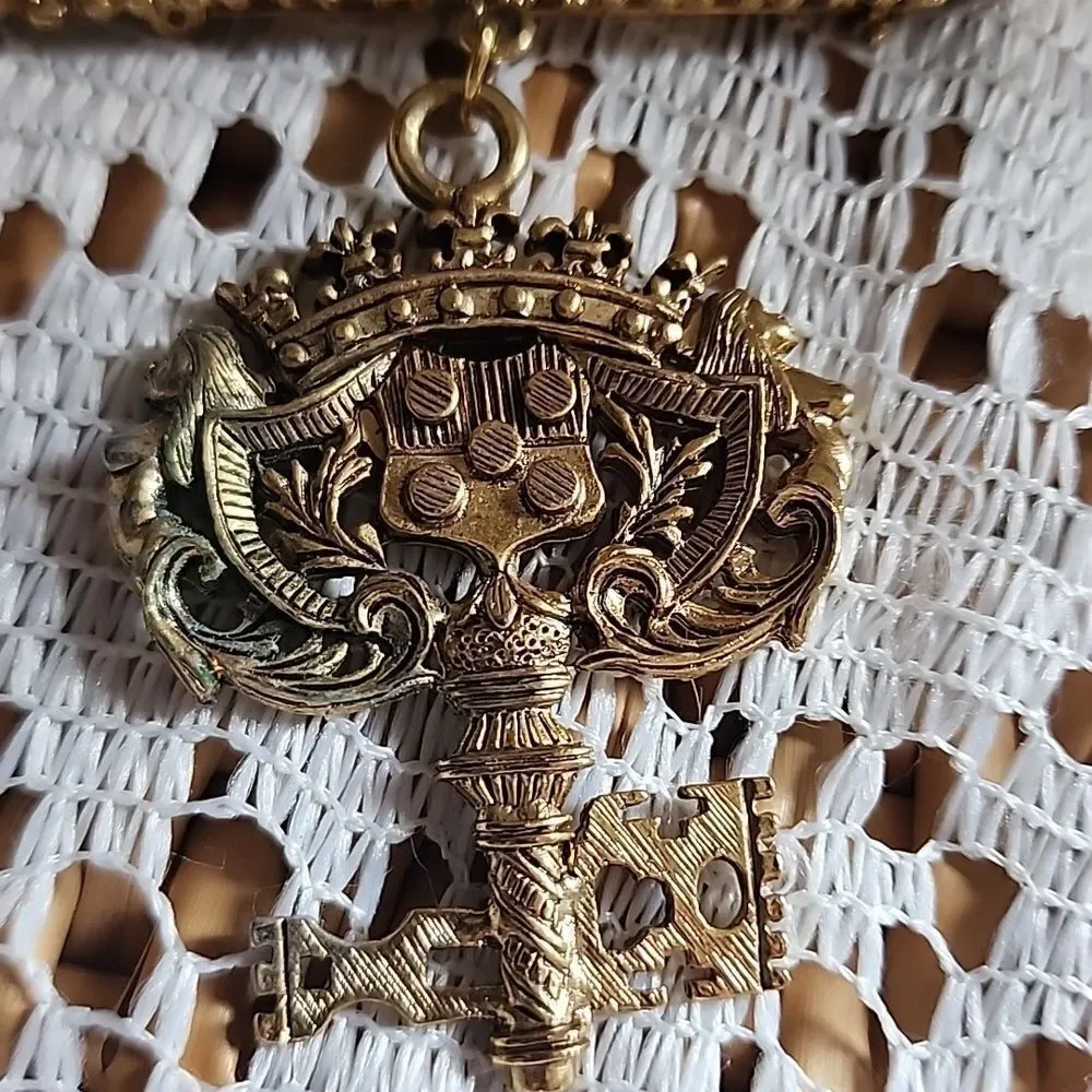 Vintage Gold Brooch with Bar & Intricate Key Design